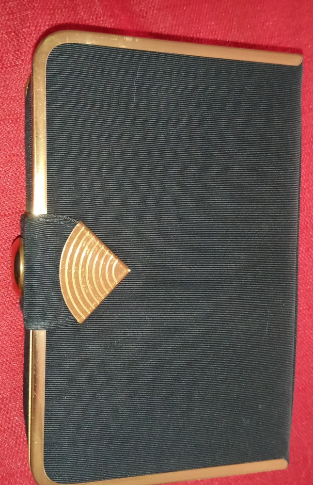 Vintage 1950's Lin Bren clutch. Snap closure. Inside pocket for comb and compact